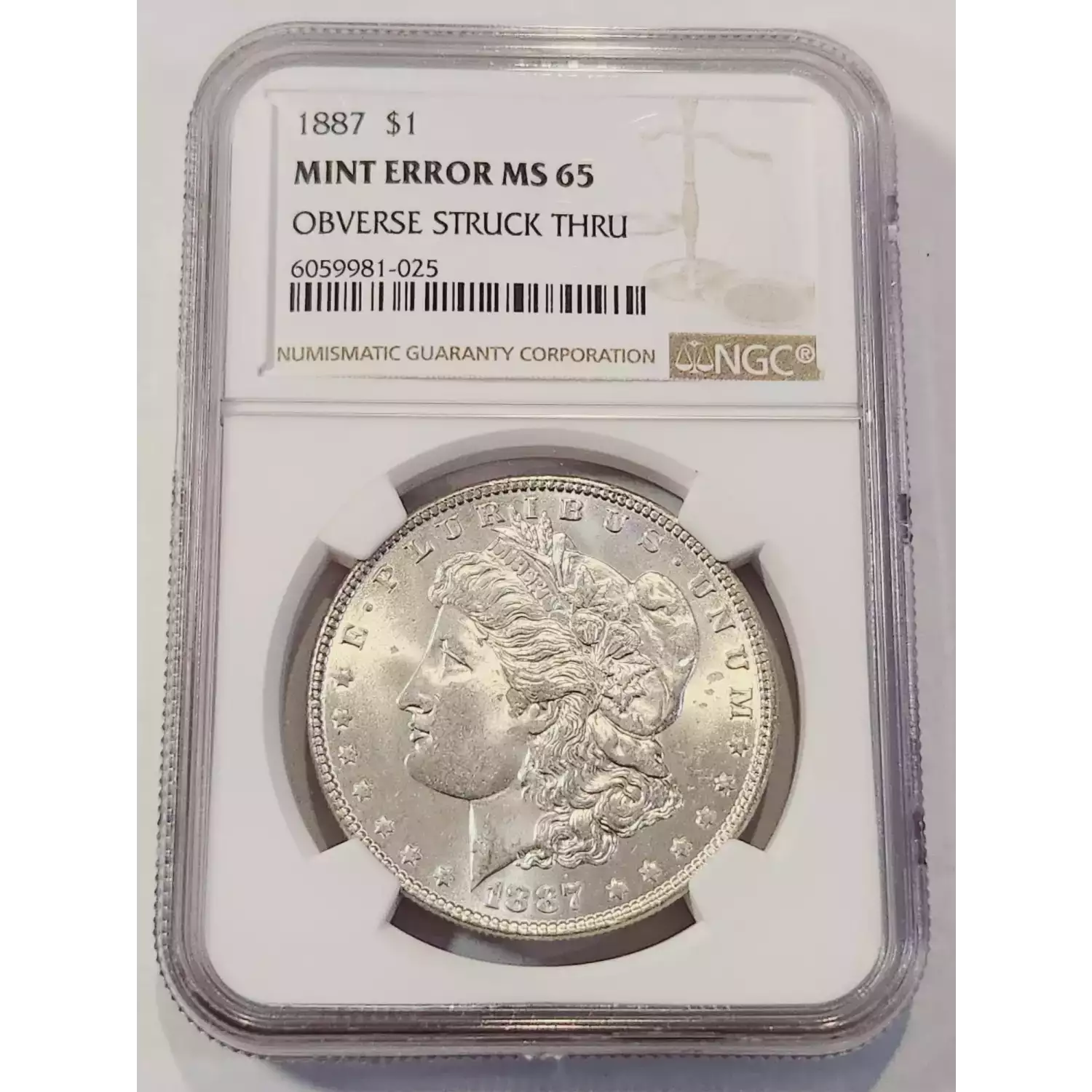 1887 Morgan Silver Dollar NGC MS 65 MINT ERROR OBVERSE STRUCK